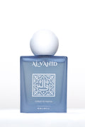 Dark blue perfume bottle labeled 'Al-Vahid' on a white background